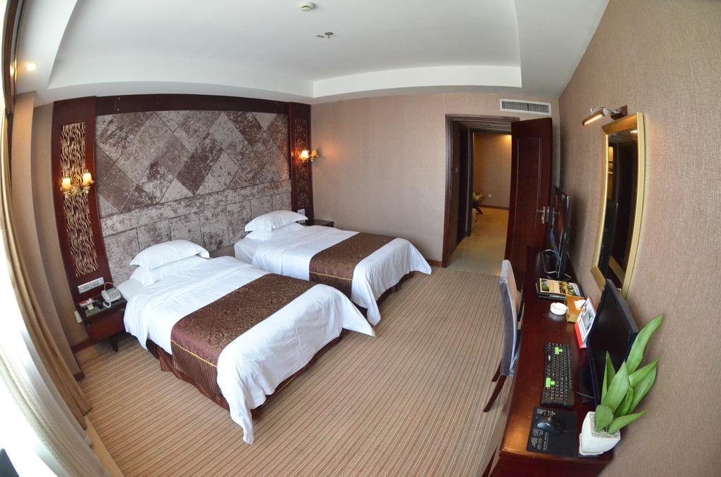 Xiamen Wanjia Oriental Hotel Quarto foto