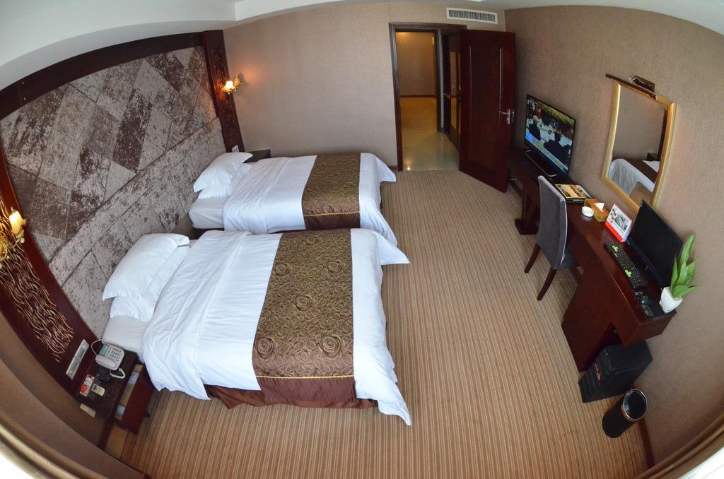 Xiamen Wanjia Oriental Hotel Quarto foto